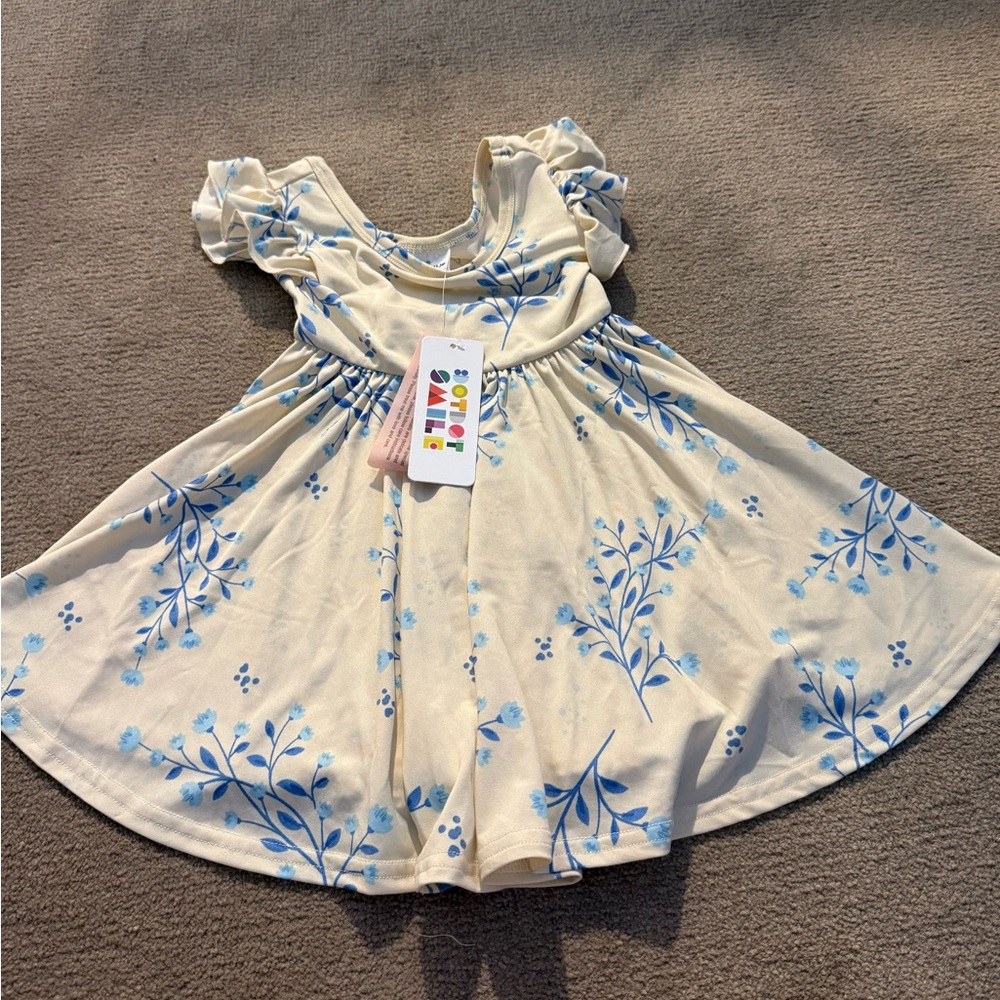 ⭐️3 for $25⭐️Dot Dot Smile Cream Dress with Blue Floral Design